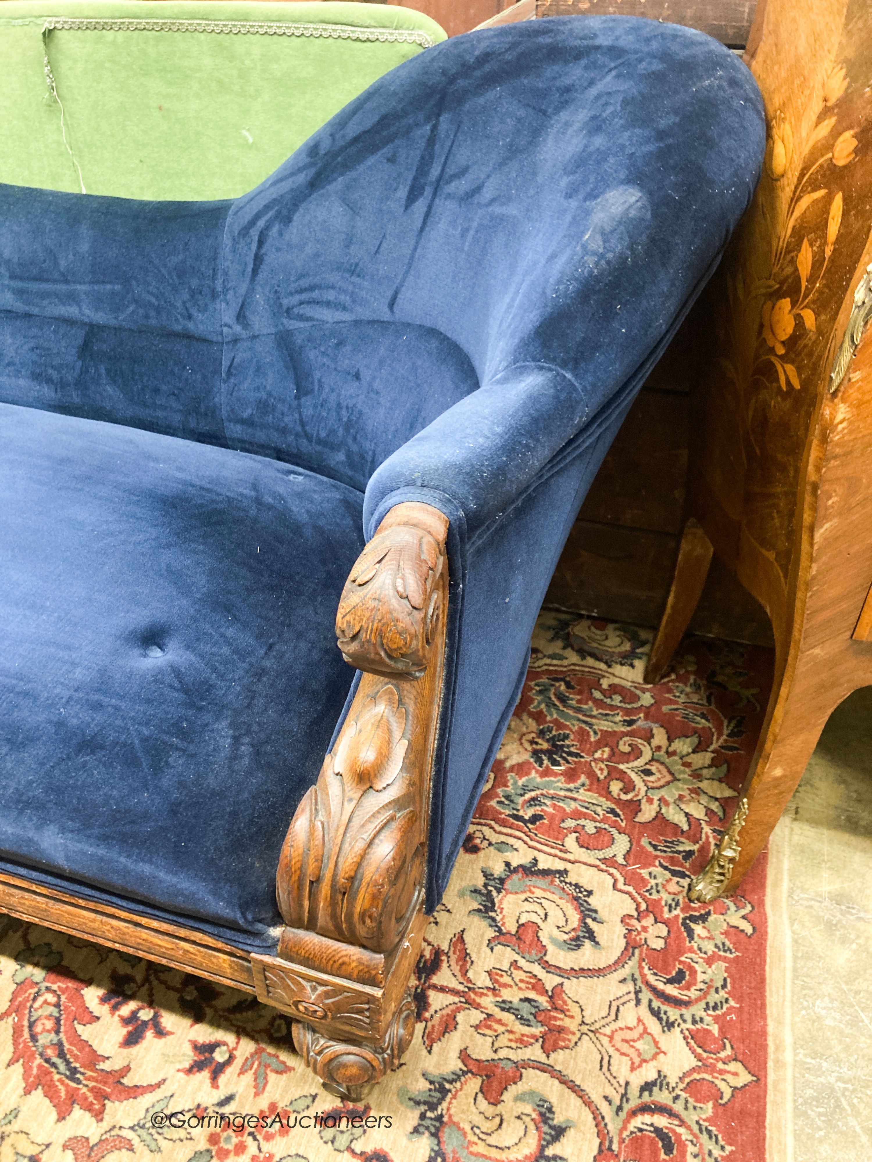 A Victorian carved oak chaise longue, W.180cm D.82cm H.84cm
